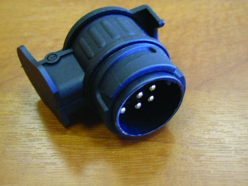 Milenco 13-pin to 7-pin lights-only towing adaptor plug showing pin connector