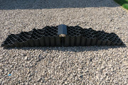 Milenco Quattro Bridge levelling bridge laid on gravel, full length view