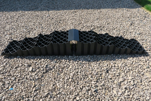 Milenco Quattro Bridge levelling bridge laid on gravel, full length view