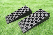 Pair of Milenco MGI Wedge Level ramps positioned together on grass