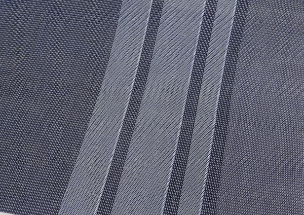 Close-up of Milenco Carpetina Classic groundsheet fabric showing woven guideline stripes
