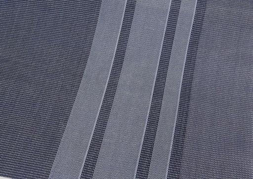 Close-up of Milenco Carpetina Classic groundsheet fabric showing woven guideline stripes