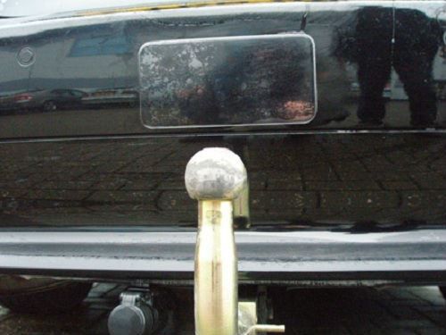 Milenco clear gel bumper protector pad fitted above a car tow ball