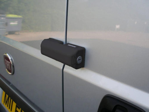 Black Milenco Van Door Deadlock fitted to a silver van door edge