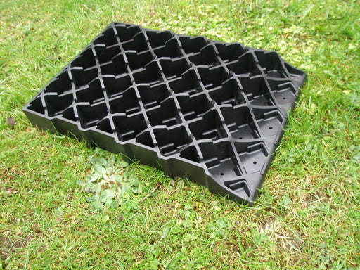 Single Milenco Stacka Level panel showing the interlocking honeycomb grid on grass