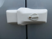 Milenco high-security white van door lock fitted close-up to a van door