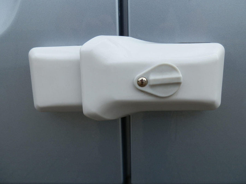 Milenco high-security white van door lock fitted close-up to a van door