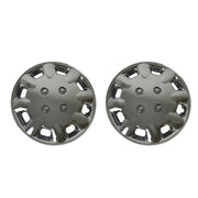 Pair of Milenco 333C chrome wheel trims shown face-on on white background